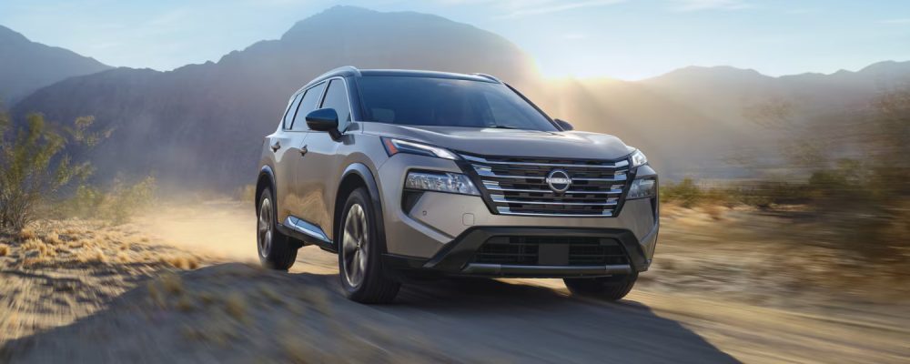 Exterior of 2025 Nissan Rogue on a dirt track.