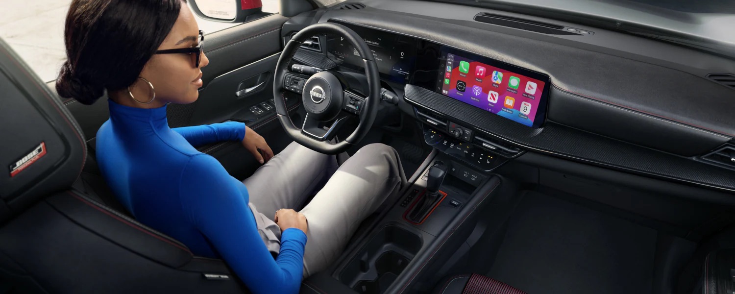Interior of the 2026 Nissan Kicks featuring the dashboard over the driver's shoulder.