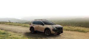 A 2026 Nissan Rogue Rock Creek trim driving around.